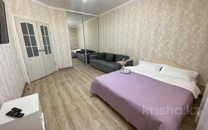 1-комнатная квартира, 42 м², 14/14 этаж посуточно, Момышулы 2/9 — Тауелсыздык Astana - photo 1