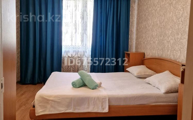 2-комнатная квартира, 85 м², 10/14 этаж посуточно, Б. Момышулы 14 — Аманат Astana - photo 1