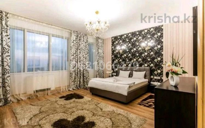 3-комнатная квартира, 140 м², 13/30 этаж посуточно, Аль-Фараби 7 — Козыбаева Almaty - photo 1