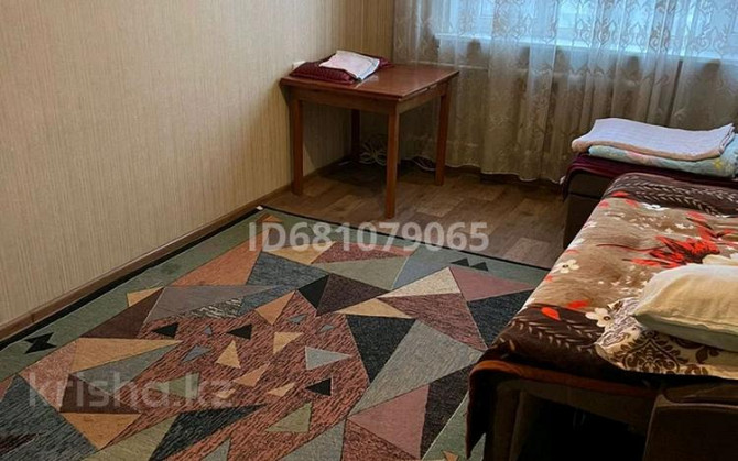 1-комнатная квартира, 40 м², 6/9 этаж посуточно, мкр Аксай-4 57 Almaty - photo 2