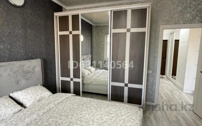 2-комнатная квартира, 60 м², 13/18 этаж посуточно, Навои 208/8 — Торайгырова Almaty - photo 3