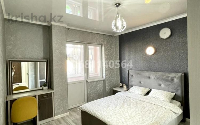 2-комнатная квартира, 60 м², 13/18 этаж посуточно, Навои 208/8 — Торайгырова Almaty - photo 1