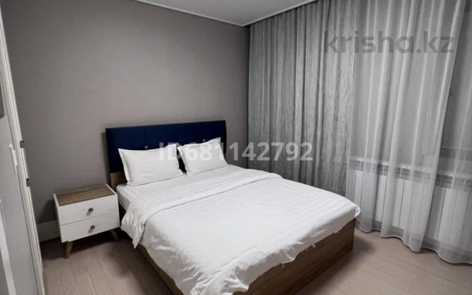 2-комнатная квартира, 55 м², 21/28 этаж посуточно, Нажимеденова 4 Astana - photo 3